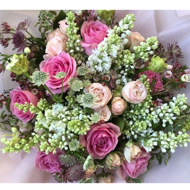 A gorgeous rosy pink bouquet of pink roses, lilac, astrantia and Star ...